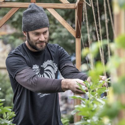 A man gardening at Manuela