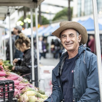 Local supplier with produce at market