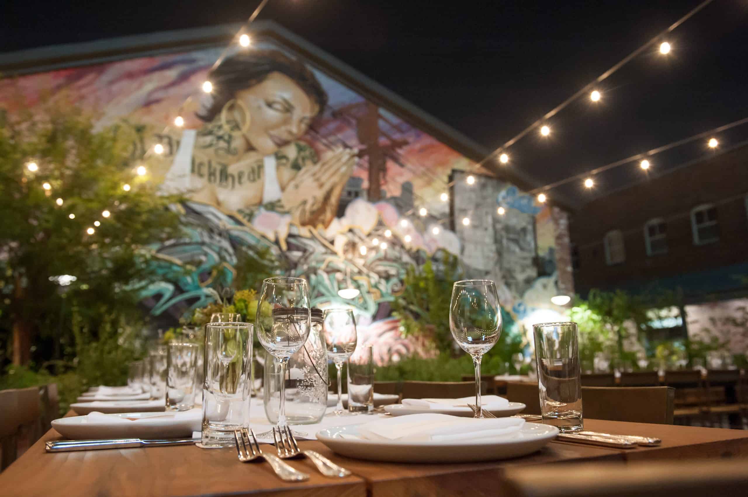 Manuela garden area at night set up for a private event