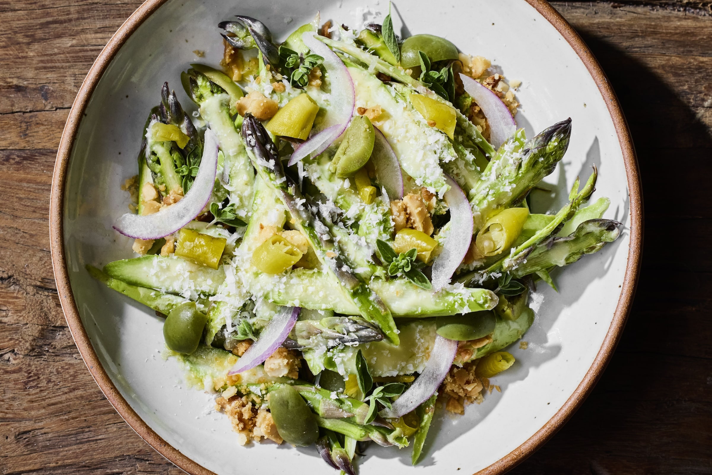 a plate of food with limes and spices