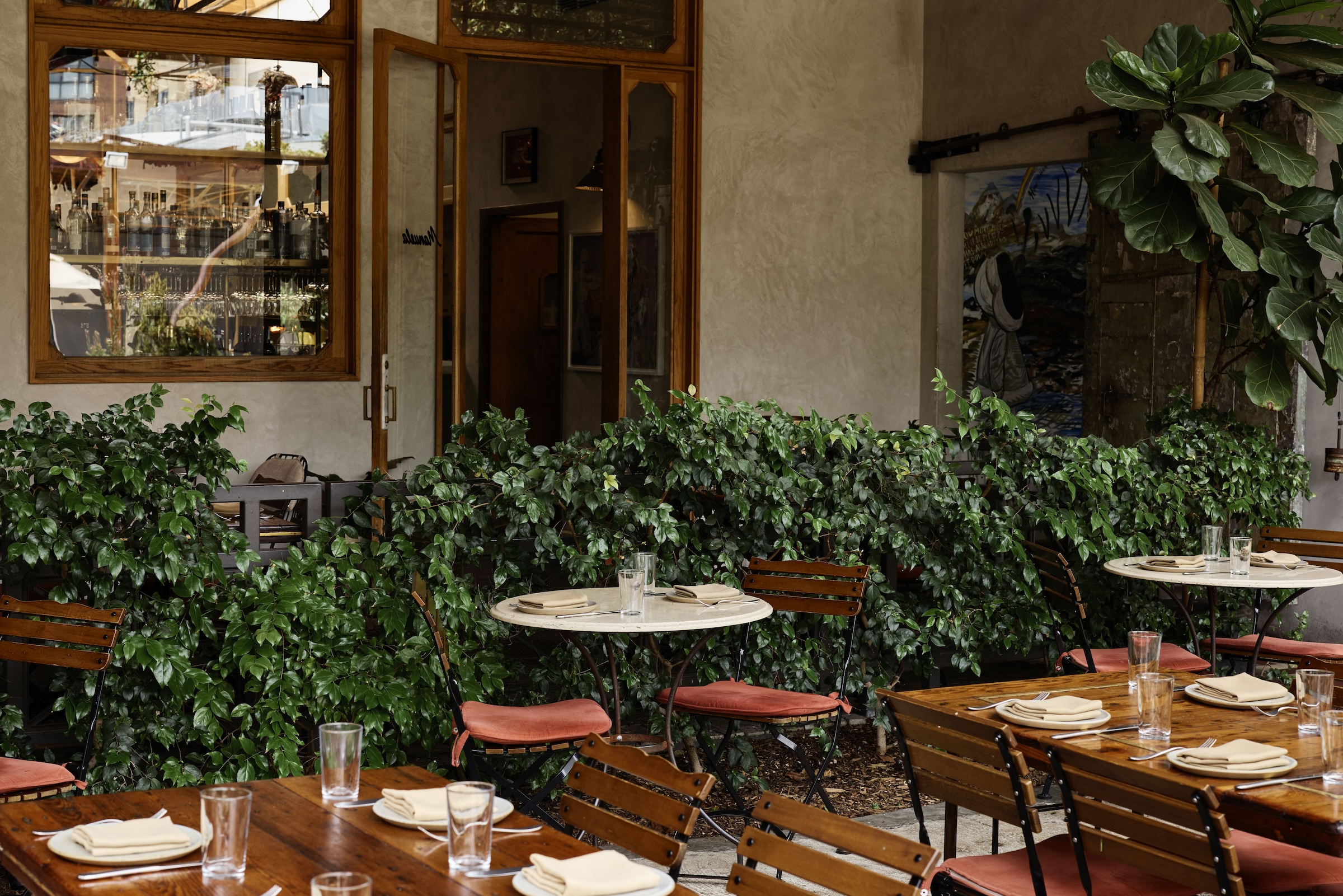 a table and chairs outside a restaurant