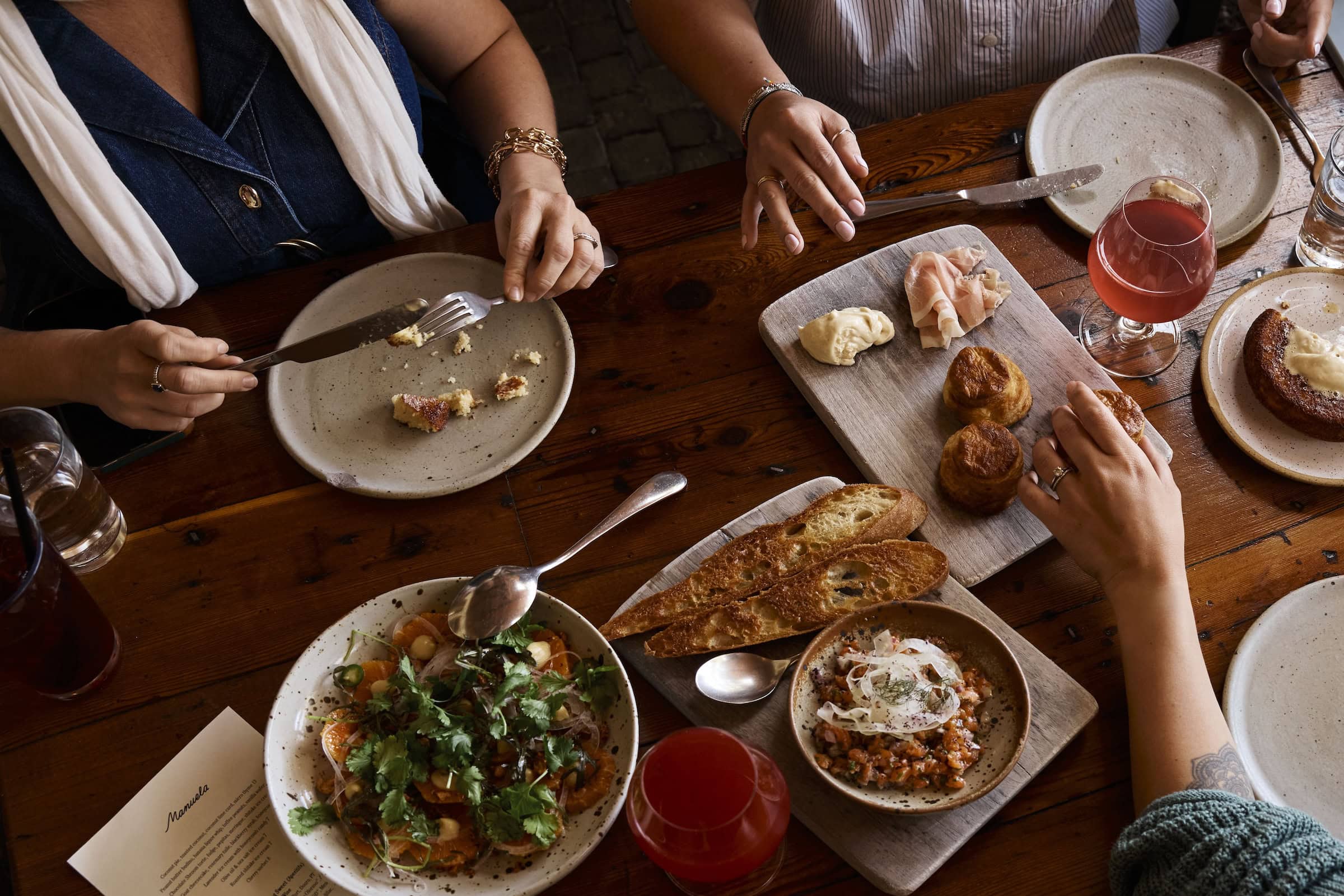a group of people eating at a table