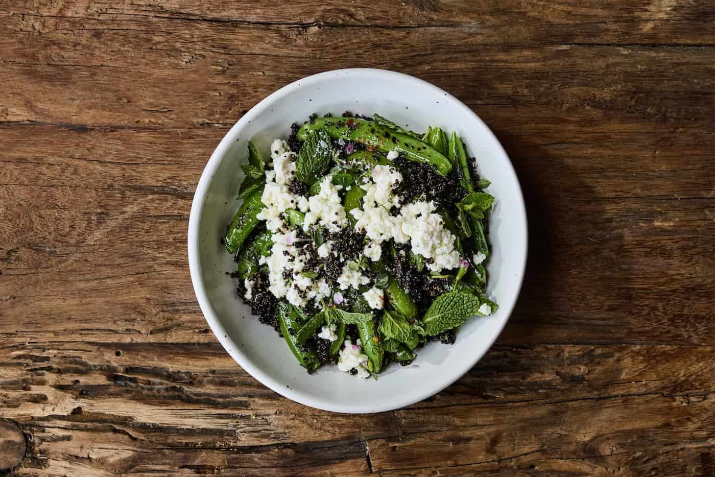 Snap Peas garnished with fresh Mint leaves